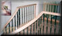Custom 10' 10" diameter with closed risers, cast iron baluster, and USS-20 profiled rails